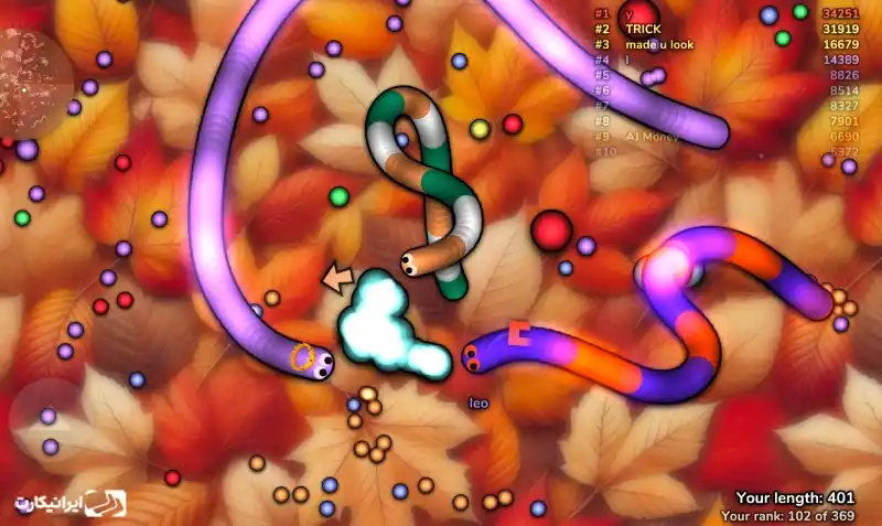 محیط رنگارنگ بازی اسلایتر دات آیو (Slither.io) با مارها و گویهای نورانی.